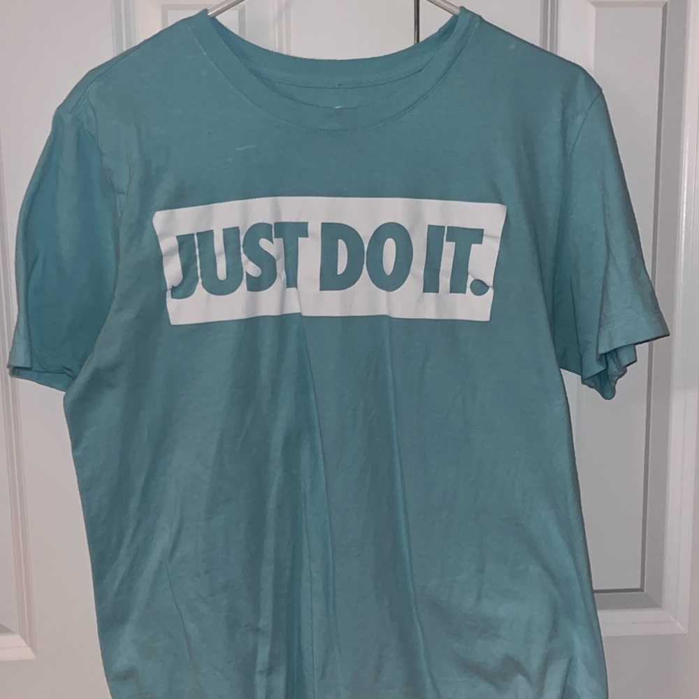 Light blue Nike shirt